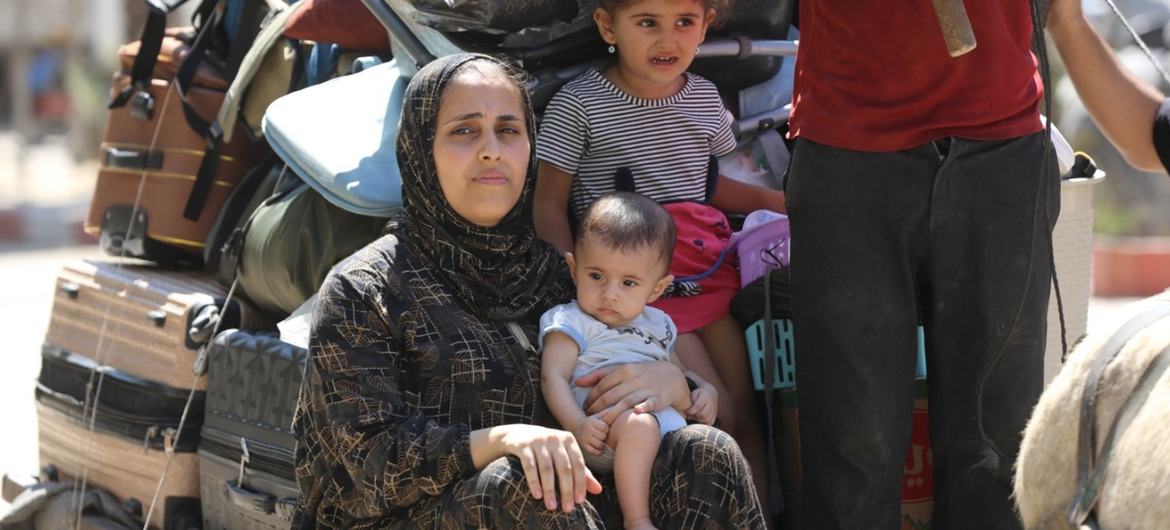 A family forced to move following evacuation orders by the Israeli authorities in Deir Al-Balah in Gaza in August. (file)