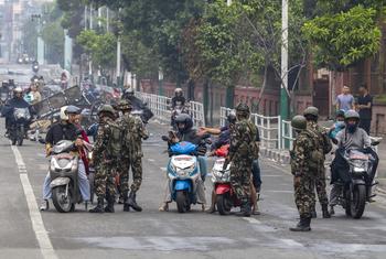 Army personnel check IDs at a checkpoint in Kathmandu after troops were deployed to restore order following youth-led anti-corruption protests that forced the Prime Minister’s resignation.