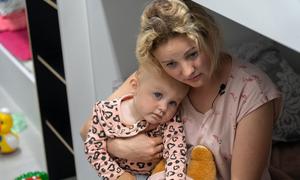 A mother and her child live in a refugee centre in Lviv after they were forced to flee violence in Zaporizhska, Ukraine.