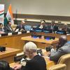 न्यूयॉर्क में UN मुख्यालय में हिंदी दिवस के अवसर पर आयोजित एक औपचारिक बैठक, जिसमें पृष्ठभूमि में भारतीय ध्वज और 'हिंदी दिवस' का बैनर दिखाई दे रहा है।