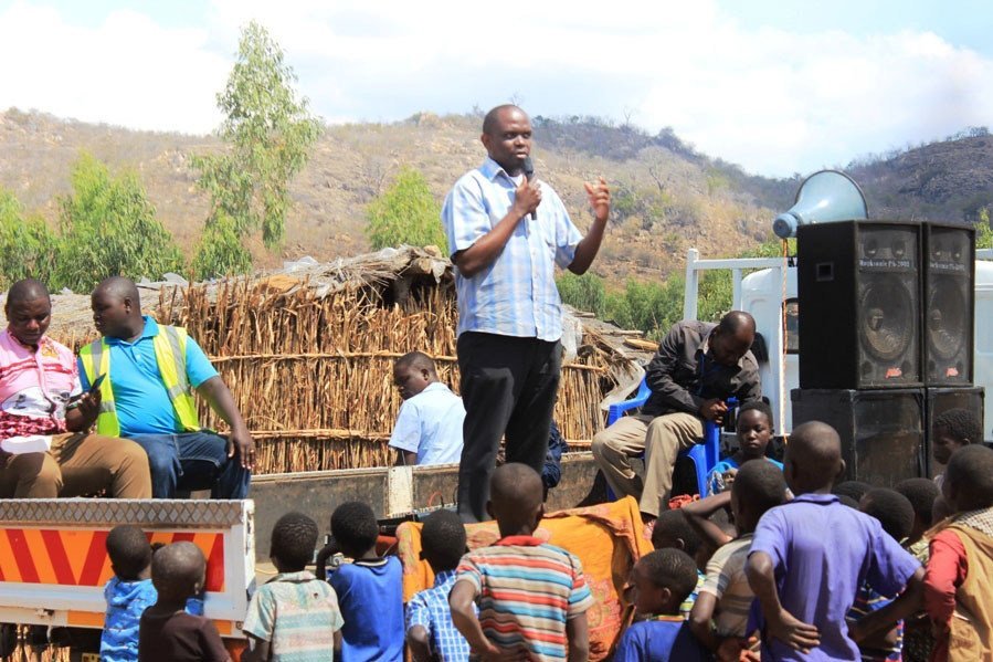 Maxwell Matewere, addresses a local community in Malawi about the threat of human trafficking.