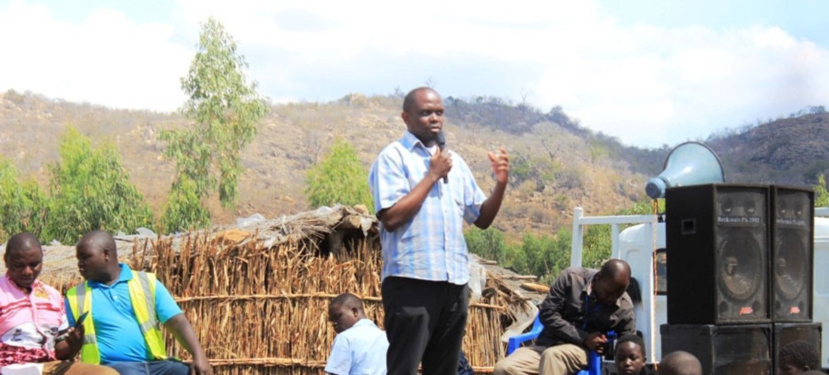 Maxwell Matewere, addresses a local community in Malawi about the threat of human trafficking.