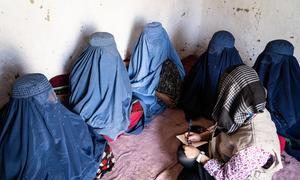An OCHA woman staff member meets displaced women in eastern Afghanistan