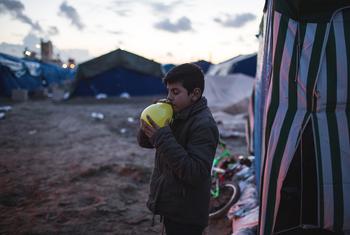 A young Syrian boy in Calais, France, is hoping to reach his uncle who is living in the UK.