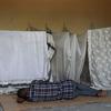 A displaced man rests in a community shelter in Bandundu, in the Democratic Republic of the Congo.