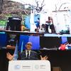 UN Climate Change Executive Secretary Simon Stiell delivers remarks in Baku, Azerbaijan, at the opening of COP29. Behind him is an image of the devastation wrought by Hurricane Beryl, which struck his home island of Carriacou, Grenada, this past July.