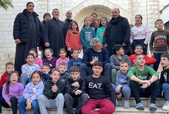 UN Resident and Humanitarian Coordinator for the occupied Palestinian territory Muhannad Hadi (sitting in the middle) visits Latin Holy Family Church in Gaza City.
