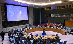 Volker Türk (on screen), UN High Commissioner for Human Rights, briefs the Security Council meeting on the situation in the Democratic People's Republic of Korea.