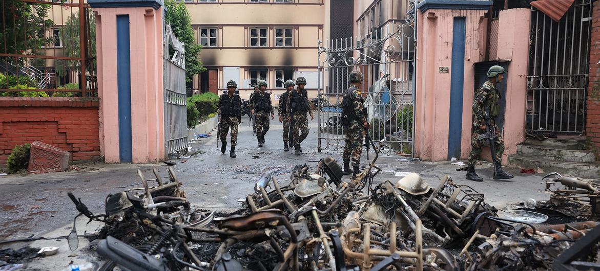 Nepal army soldiers at the Supreme Court after the complex was set on fire by protesters.