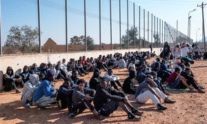 Migrants sit in the courtyard of a detention centre in Libya. (file)