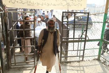 An Afghan refugee entering a registration center of Pakistan's National Database and Registration Authority (NADRA) set up near the border town of Torkham.