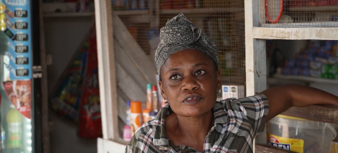 Charlotte Fatuma, a refugee from the Democratic Republic of the Congo (DRC, runs a shop at the Coranne IDP site in Mozambique, thanks to electricity connected by UNHCR in collaboration with the World Bank and the African Development Bank.