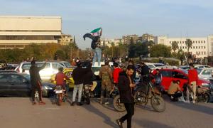 The Syrian people gather to celebrate at Damascus' Umayyad Square.