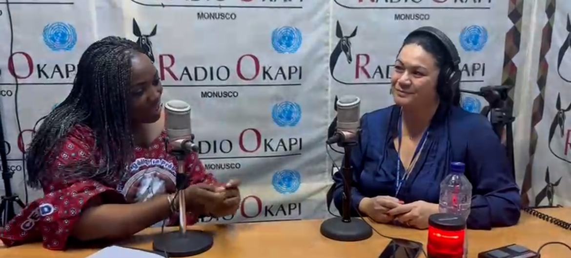 On World Radio Day 2024, Radio Okapi chief Joyce Fernandes de Pina (right) and Theresa Kankou, in charge of Radio Okapi-community radio relations, discuss the power of radio.