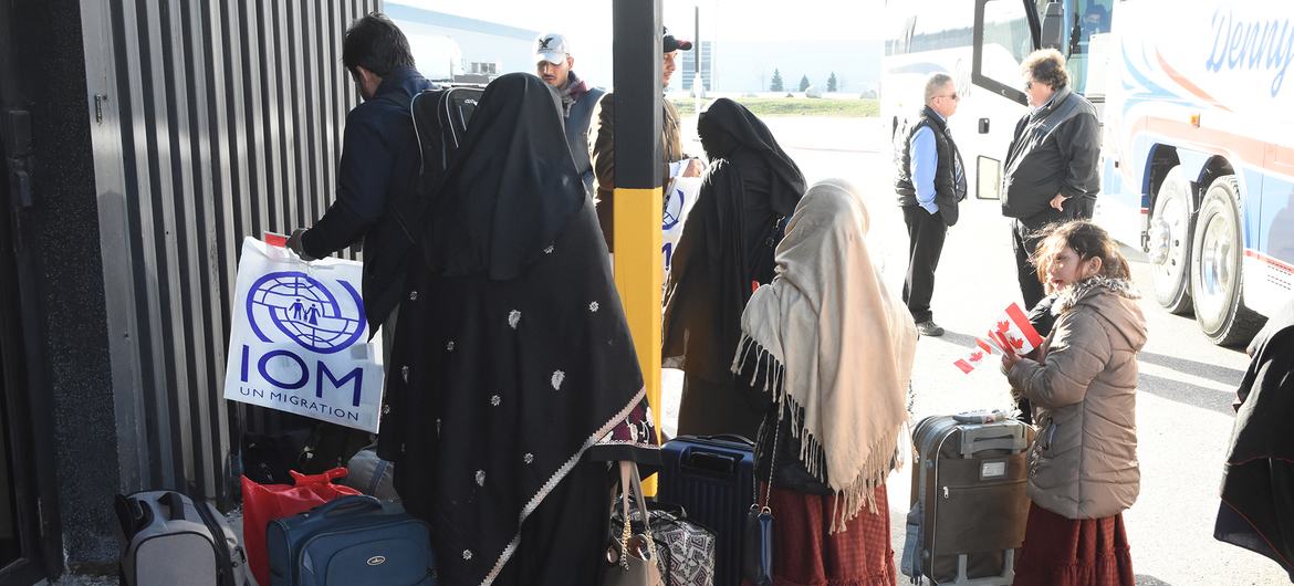 Since August 2021, thousands of Afghans have been resettled to Canada on flights supported by IOM.