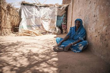 A woman who fled her home due to conflict rests at a centre for displaced people in El Fasher, Darfur. (file)