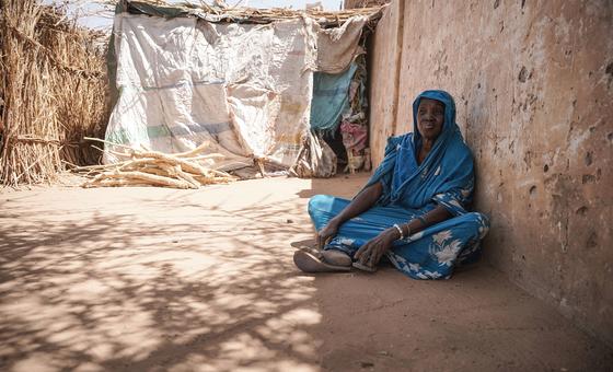  A woman who fled her home due to conflict rests at a centre for displaced people in El Fasher, Darfur.