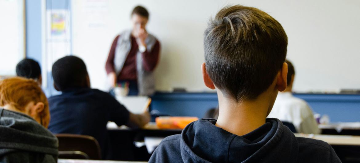 Children in their classroom at school.