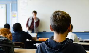 Children in their classroom at school.