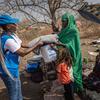 UNHCR distributes relief items to returnees at a transit centre in Renk, South Sudan.