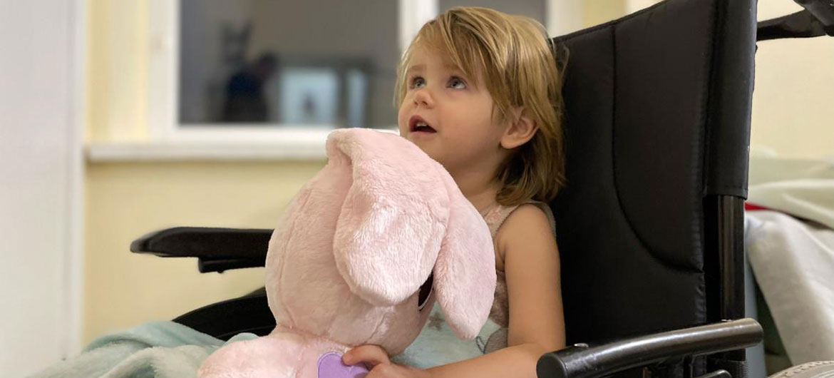 When a missile struck her home in Ukraine, two-year-old Lisa lost the use of her legs. Now she is on the road to recovery, thanks to her parents.