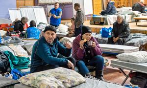 People who have been displaced by the war in Ukraine stay in a transit centre in Dnipro.