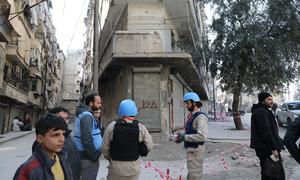 Samir Elhawary (left), UN disaster relief (UNDAC) team leader, speaks with residents of Aleppo, Syria.