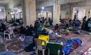 Families shelter at a mosque in the Al-Midan district of Aleppo, Syria, which has been turned into a collective shelter.