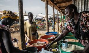 A woman buys food at a market in Bor, South Sudan. (file)