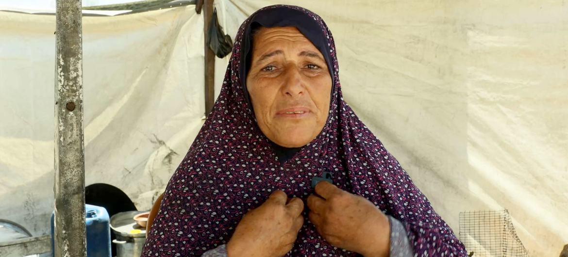 Badriya Barrawi, a displaced person in Gaza, is living among the ruins of destroyed buildings.