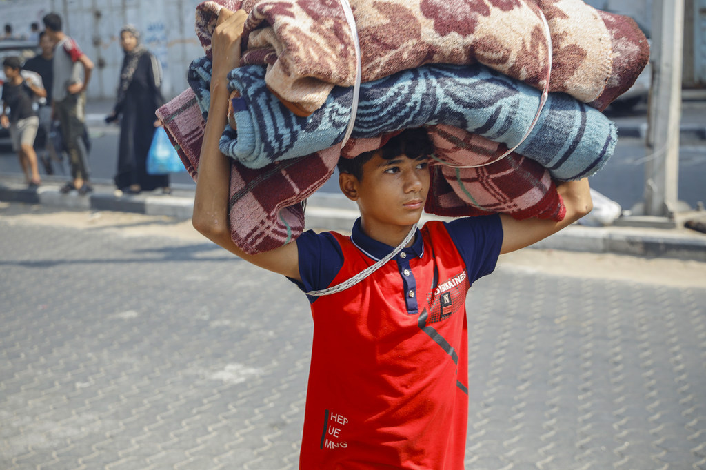 Israel-Palestina: niño fuga de Gaza (Foto: ONU). 