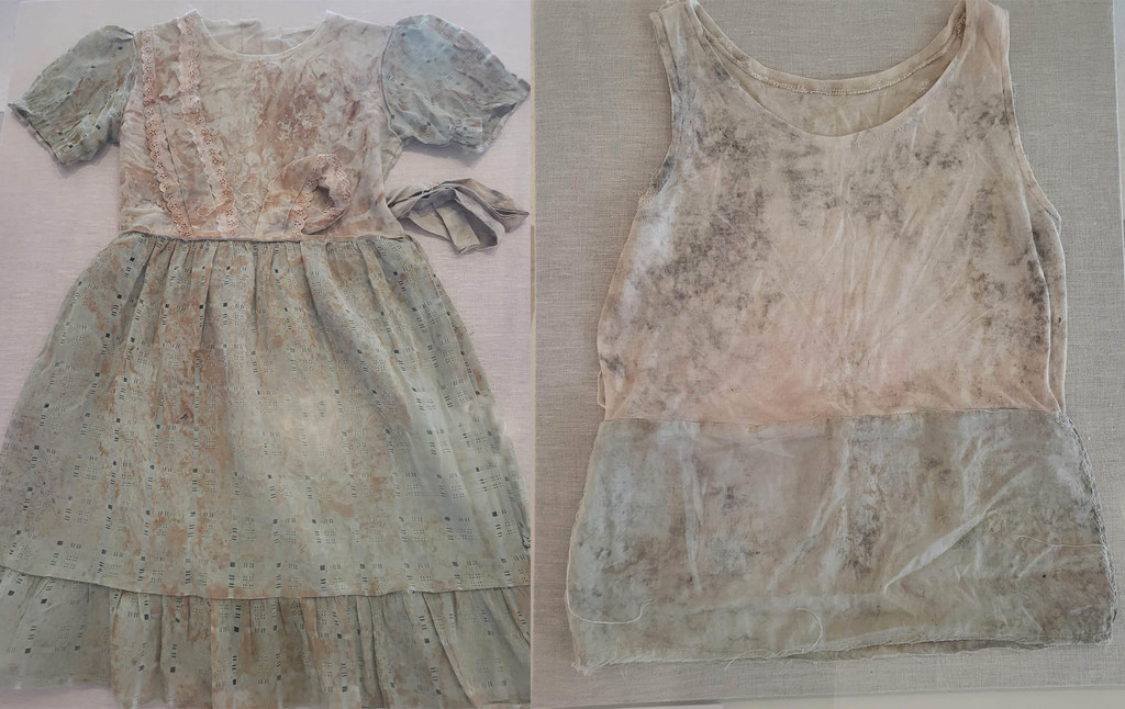 Clothes of Immaculée Songa's two daughters, Clarisse and Raissa, on display at the United Nations exhibition "Stories of Survival and Remembrance - A Call to Action Against Genocide"