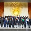 Le secrétaire général de l'ONU, António Guterres (au centre à gauche), entouré de dirigeants africains pour la « photo de famille » lors du sommet de l'Union africaine à Addis-Abeba, en Éthiopie.