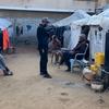 Watu waliokimbia makazi yao wakiwa kwenye mahema katika kambi katika eneo la Al-Nuseirat katika Ukanda wa Gaza.