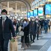 在东京品川，通勤者戴着防护口罩。