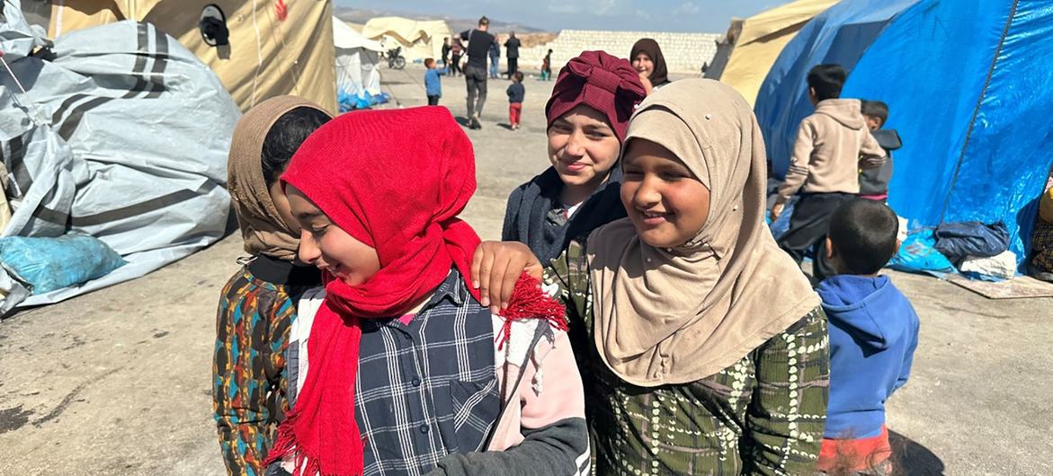 Young girls play at a reception center for displaced people in Jindairis, Aleppo governorate.