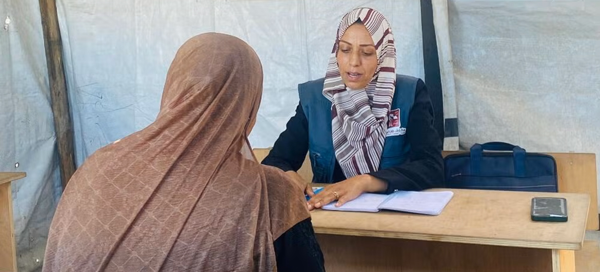 Amal works at the UNFPA-supported Women’s Affairs Centre in the Bureij refugee camp. A mother of three children, she has been displaced four times and lost ten family members in the war. Amal works at the UNFPA-supported Women’s Affairs Centre in the Bureij refugee camp. A mother of three children, she has been displaced four times and lost ten family members in the war.