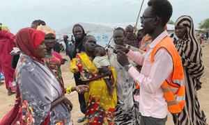 Displaced people fleeing the crisis in Sudan arrive in Renk, South Sudan.