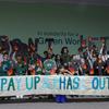 Participants at COP29 in Baku, Azerbaijan, advocate for financing climate initiatives.
