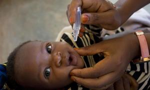 A child receives a polio vaccine in Burundi. (file)