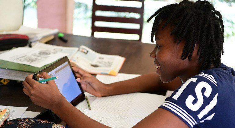 A girl studies online at home in Abidjan in Côte d'Ivoire.