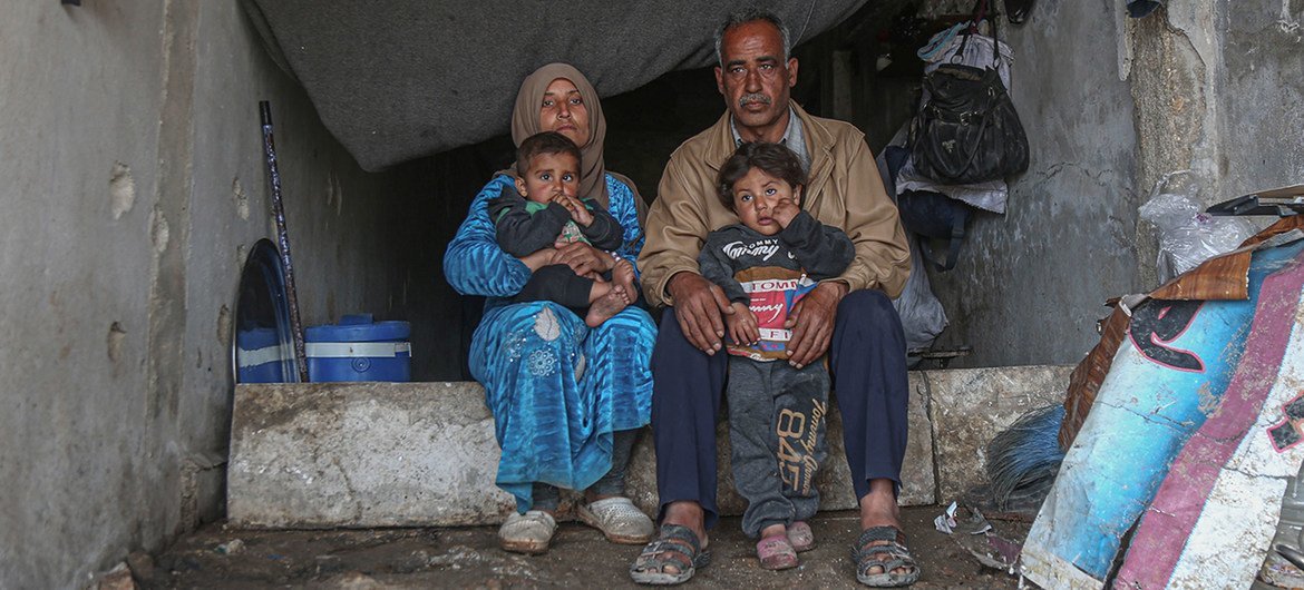 An internally displaced family lives in a damaged school in the town of Binish in Idlib, Syria (file).