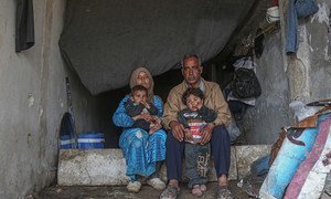 An internally displaced family lives in a damaged school in the town of Binish in Idlib, Syria (file).