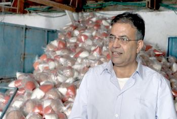 Mr. Adnan Abu Hasna, Media Advisor at UNRWA in his visit to Food Distribution Center in a Refugee Camp in Gaza.
