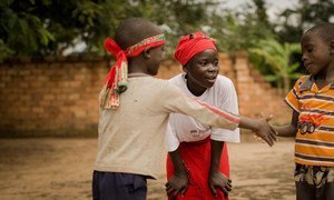 School children take part in an activity to raise awareness about peacebuilding, with support from UNICEF's Learning for Peace programme.