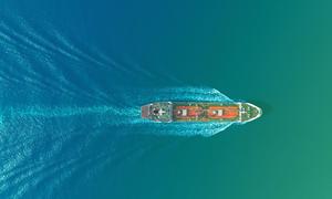 Aerial view of an oil tanker ship at sea.