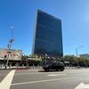 The Secretariat building with flags of Member States in the foreground, at UN Headquarters, in New York.