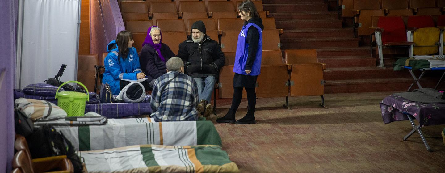 Newly displaced from Donetsk region of Ukraine receive support at transit hub.