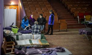 Newly displaced from Donetsk region of Ukraine receive support at transit hub.
