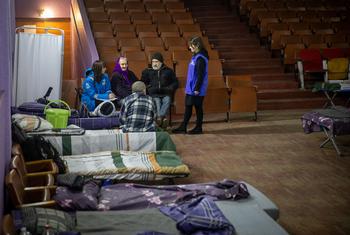 Newly displaced from Donetsk region of Ukraine receive support at transit hub.